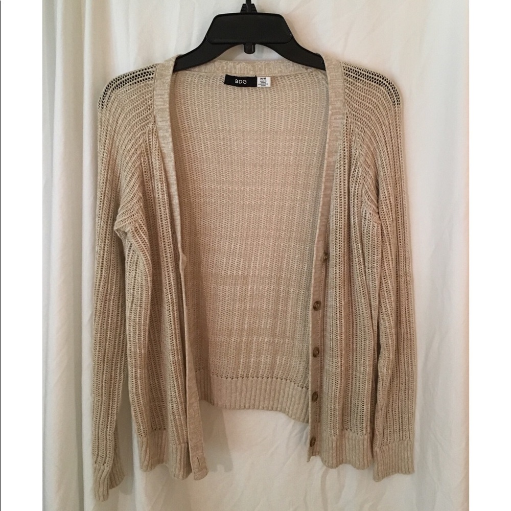 Beige loose knit cardigan from Urban Outfitters